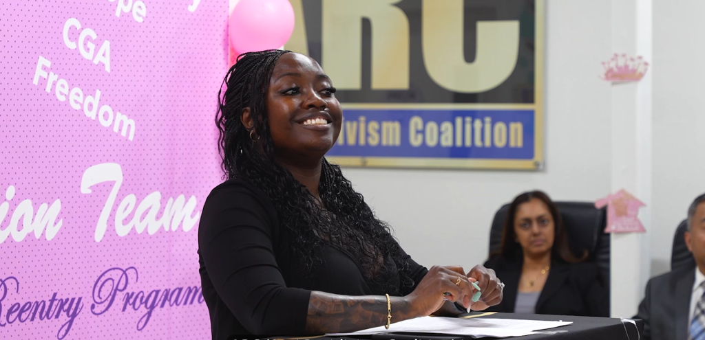 ARC life coach speaks at the graduation.