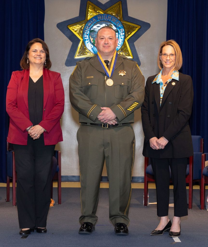 Officer Rogelio Tienda receives the Gold Star.
