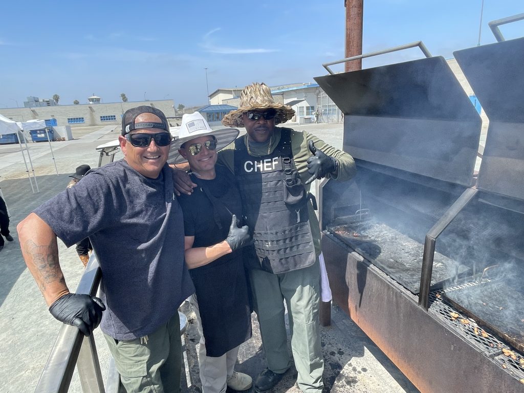 RJD staff work the barbecue for appreciation day.