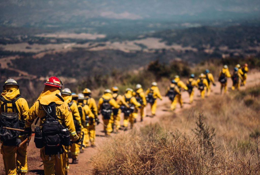 incarcerated firefighters hiking mountain side