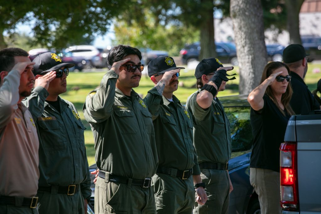 CDCR staff salute process for Agent Joshua Byrd.