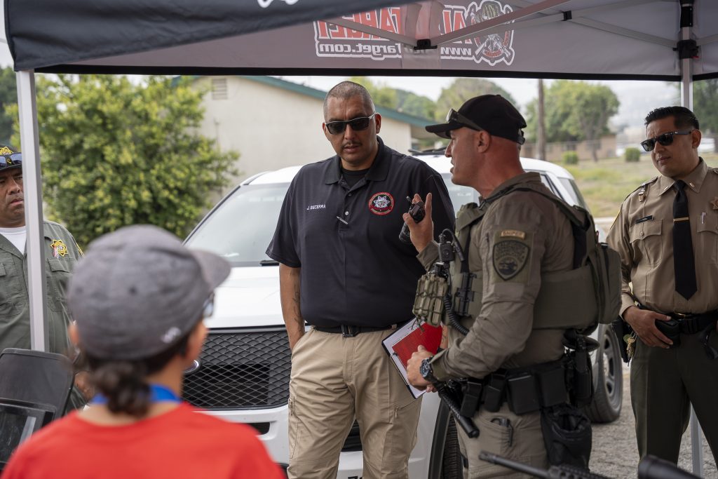 Answering questions at CIM Junior Academy.