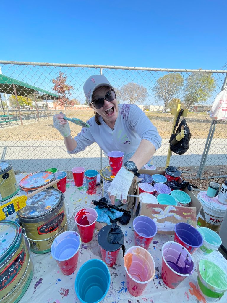 Enjoying the creative atmosphere around the CIW mural project.