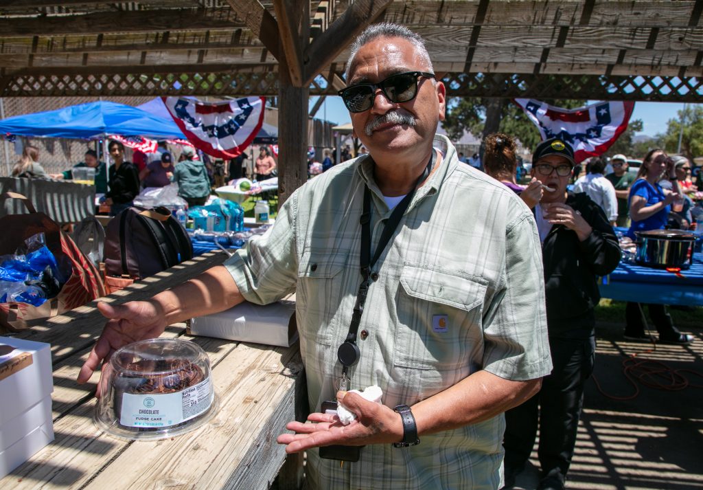 A staff member poses during an Independence Day party at CTF-Soledad.