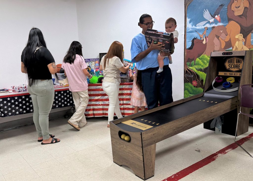 Children received prizes at Folsom State Prison.