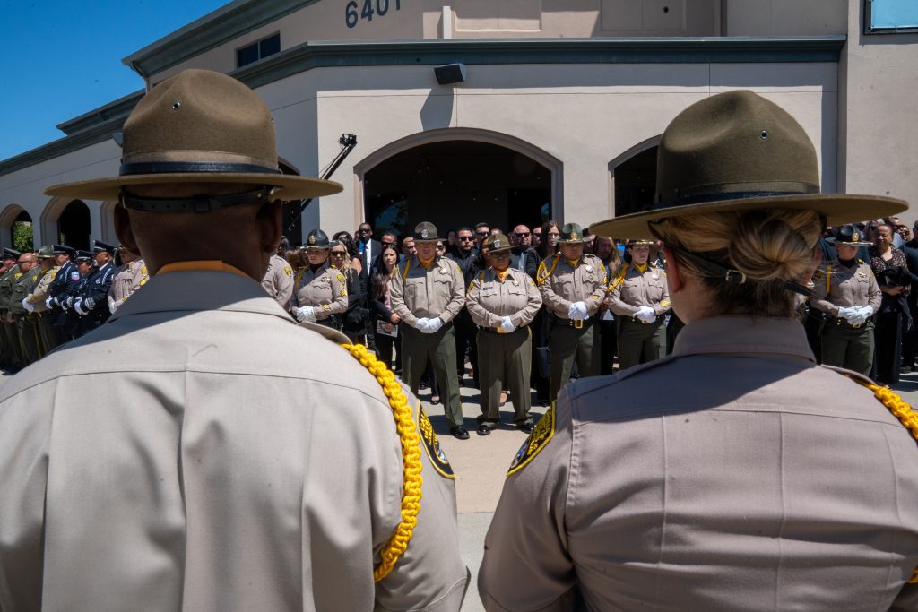 Staff await the arrival of the casket.