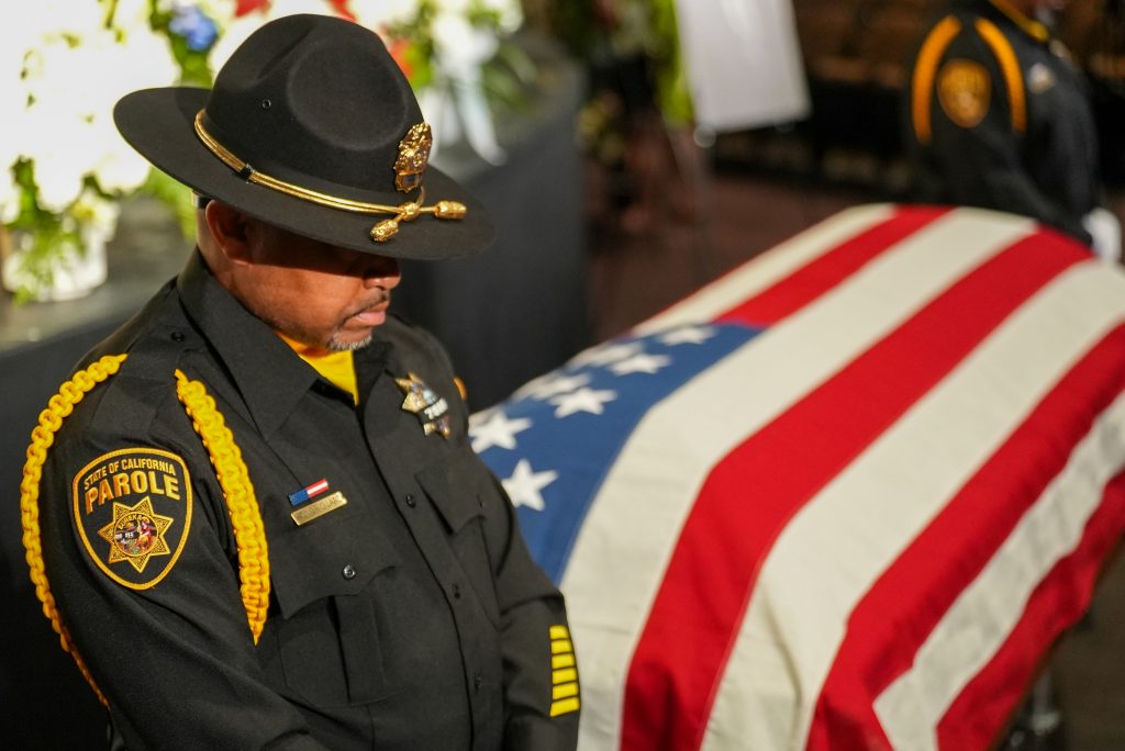 Flag-draped casket for Parole Agent Joshua Byrd.