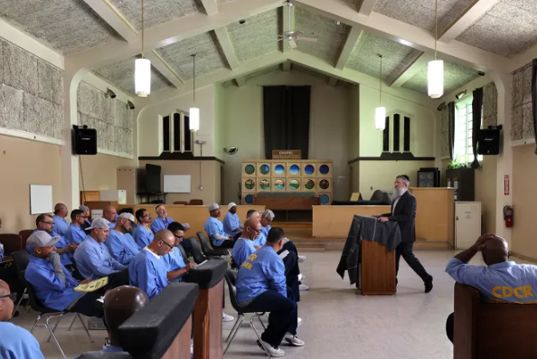 Rabbi Yochanan Friedman, who directs Chabad by the Sea in Santa Cruz, leads a session of Choices for Life at the chapel at the California Department of Corrections and Rehabilitation’s Correctional Training Facility in Soledad.