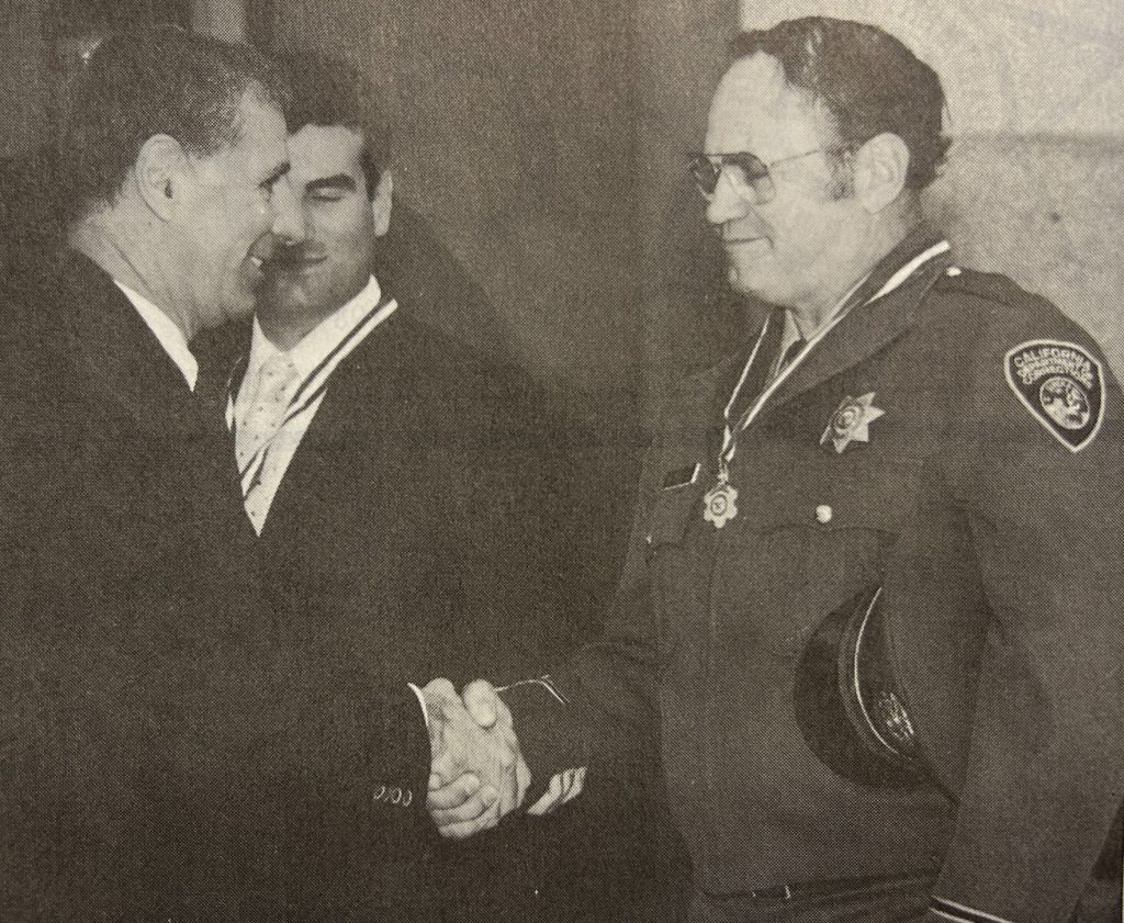 Richard Wright, correctional officer, receives one of the first Medal of Valor awards in 1987.