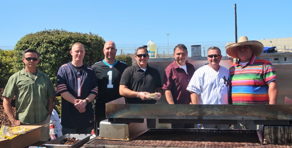 Betzinger and PBSP employees at a BBQ