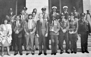 1989 Medal of Valor at the State Capitol with the governor and award honorees.
