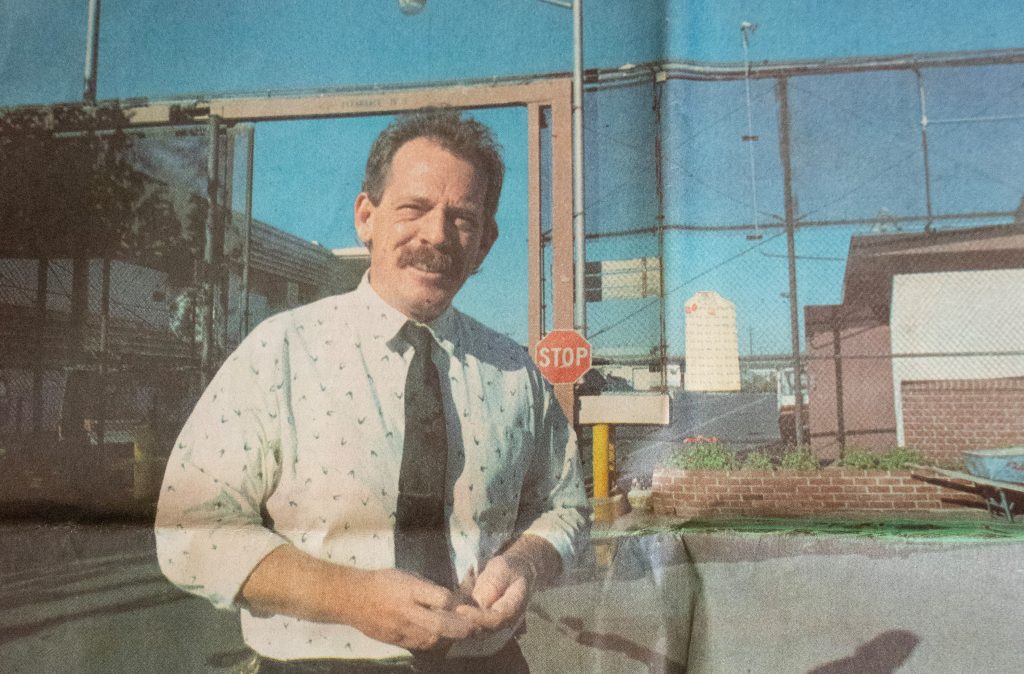 John Berge stands outside the gates at California Institution for Men in Chino in this newspaper feature story written about him decades ago.
