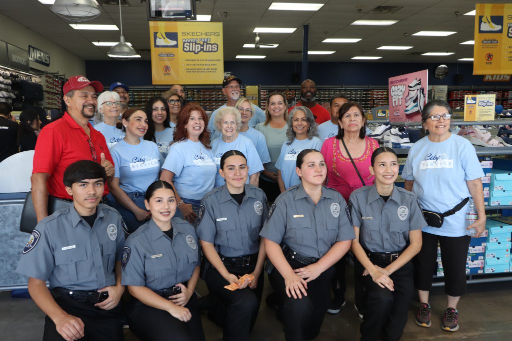 Volunteers at Centinela State Prison's shoe giveaway event for disadvantaged youth
