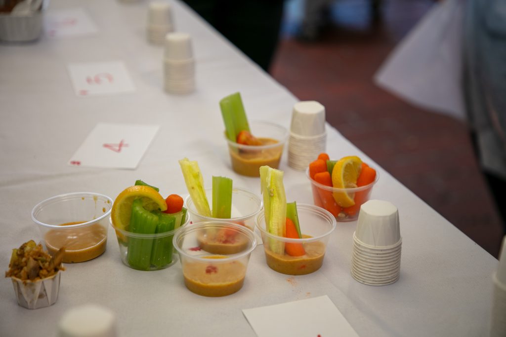 Dishes with a hummus sauce.