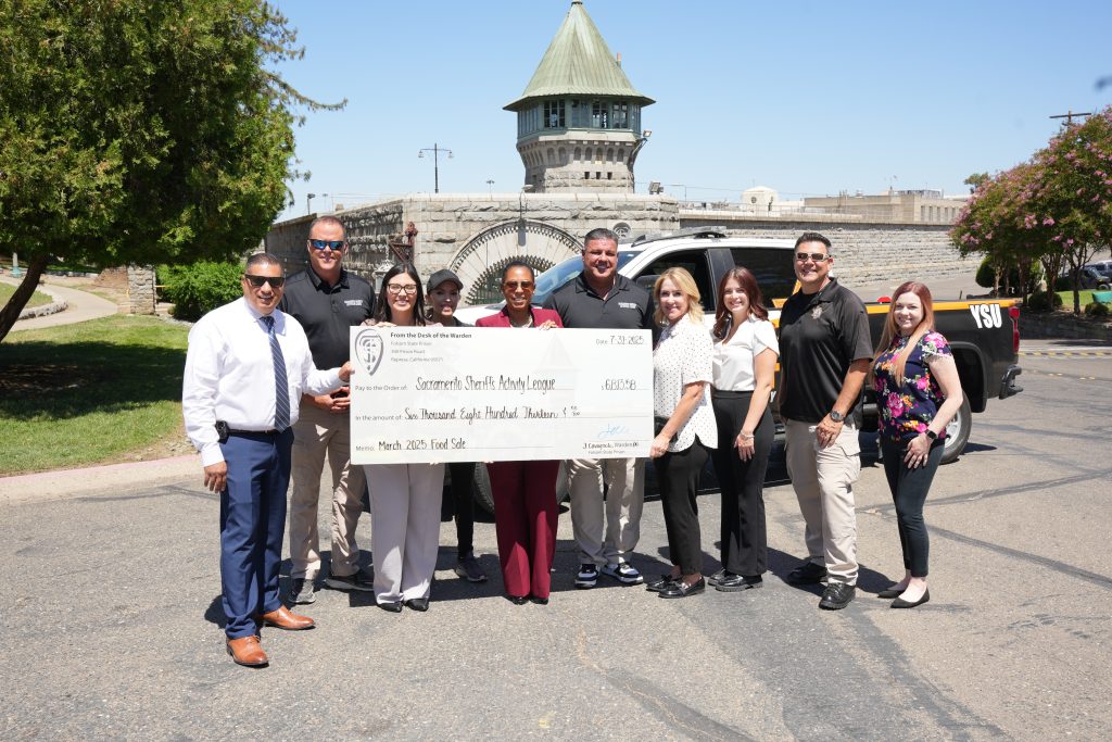 FSP staff presenting donation check to Sacramento Sheriff's Activity League (SAL)