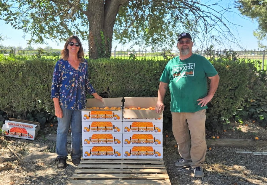 Apricot farmer and Spork Food Hub delivery driver