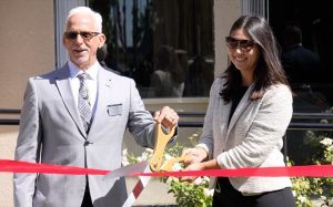 Cutting ribbon at the Male Community Reentry Program (MCRP) in Fresno.