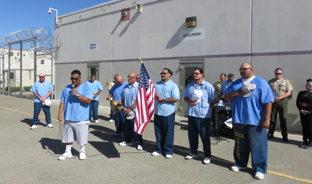 Veterans on Facility B at PVSP open by singing the National Anthem.