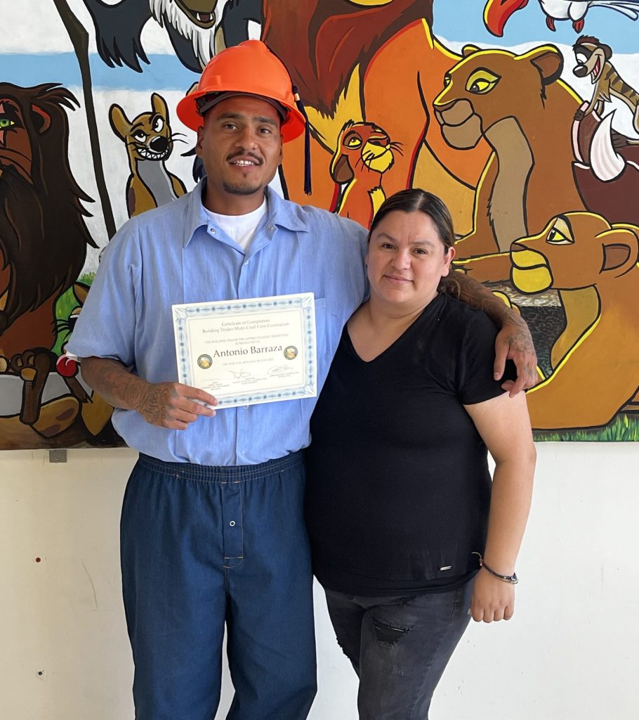 CCM graduate with family member