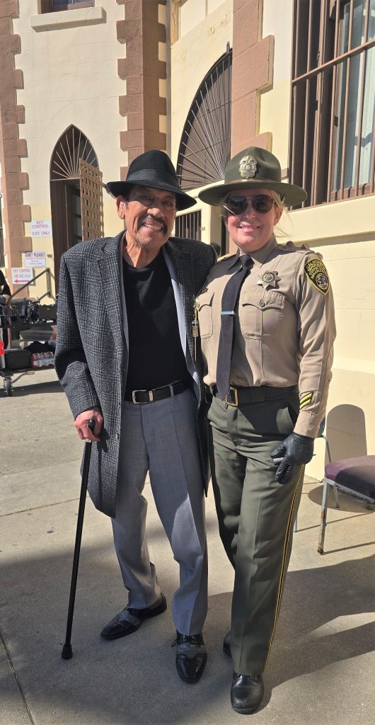 Trejo with a correctional officer.