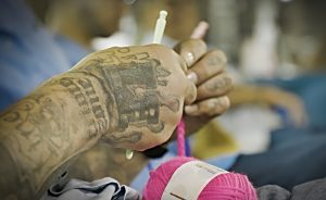 Stitch and Time documentary image of a man crocheting at California Medical Facility in Vacaville, Calif.