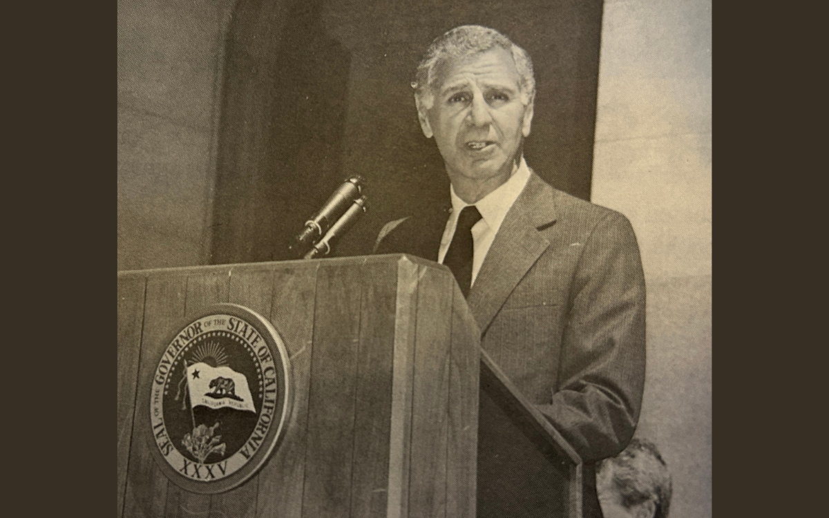 At the 1990 Medal of Valor, Gov. Deukmejian speaks at a lectern.