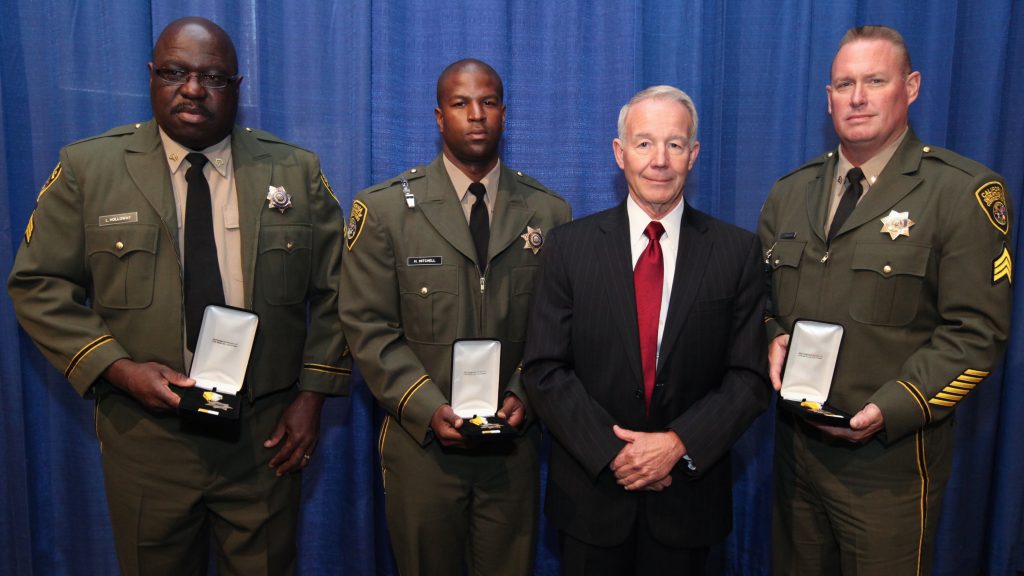 Three officers receive bronze star, 2013.
