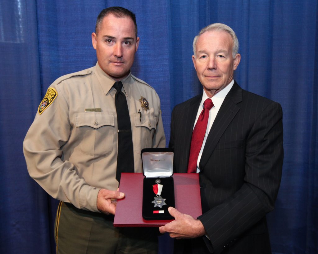 A CDCR correctional officer receives silver star in 2013.