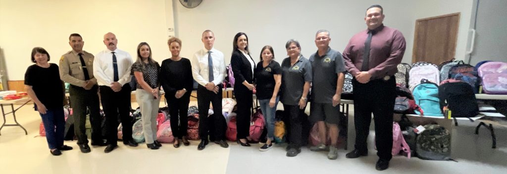 Staff with the donations for the CAL back to school drive.