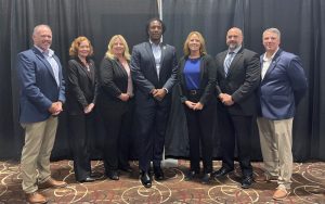 DAPO staff and leadership with Parole Agent Kristen Blehm.