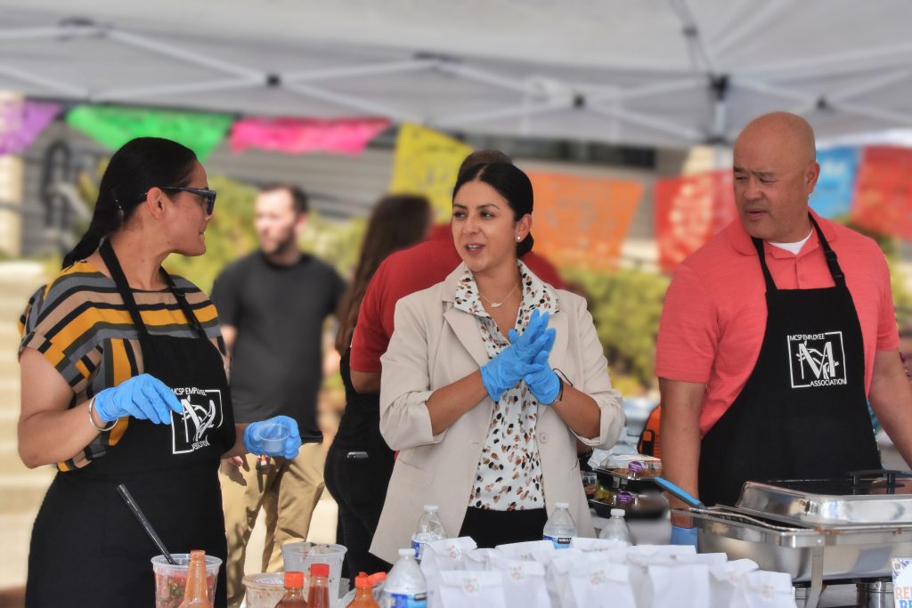 Serving food at the staff appreciation weekend fiesta at Mule Creek State Prison.