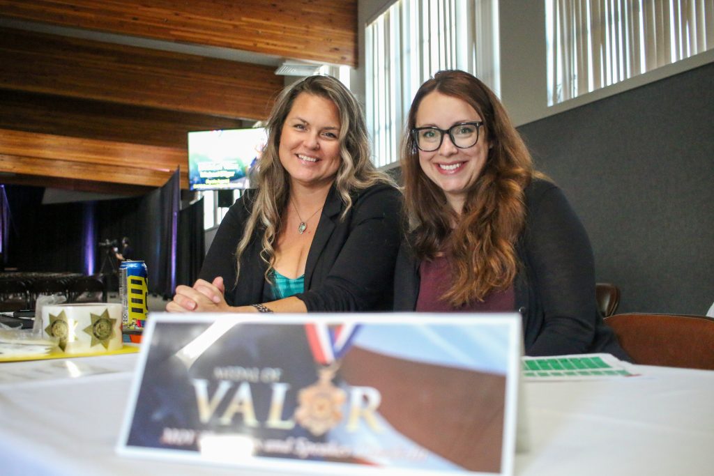 Liz Gransee and Amanda Spangler, Medal of Valor check-in table.
