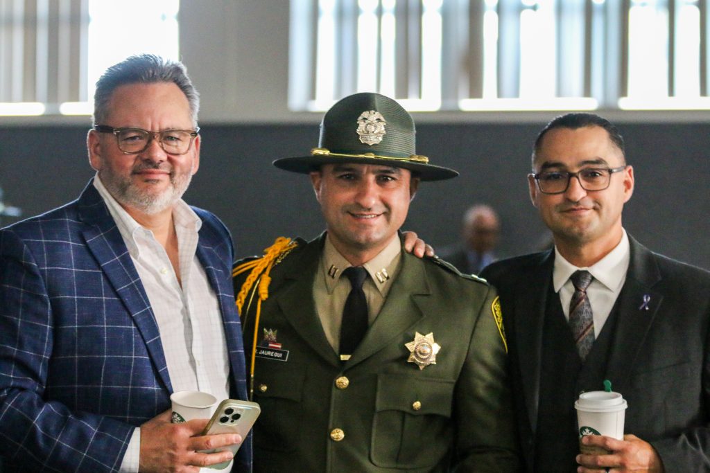 Pedro with the twin staff members. 