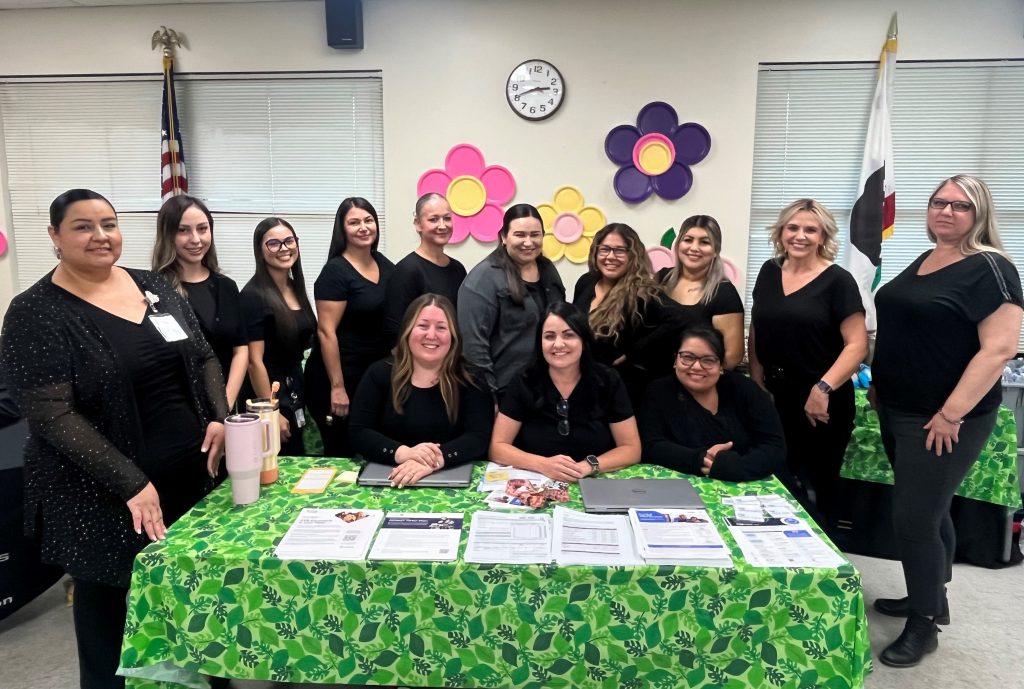 Personnel staff at a booth at PVSP health fair.
