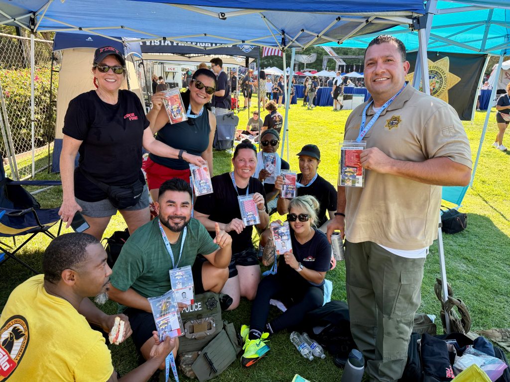 RJ Donovan staff with the plaque of who they are walking to remember, Parole Agent Joshua Byrd.