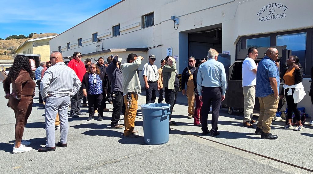 Staff waiting in line for the barbecue at San Quentin.