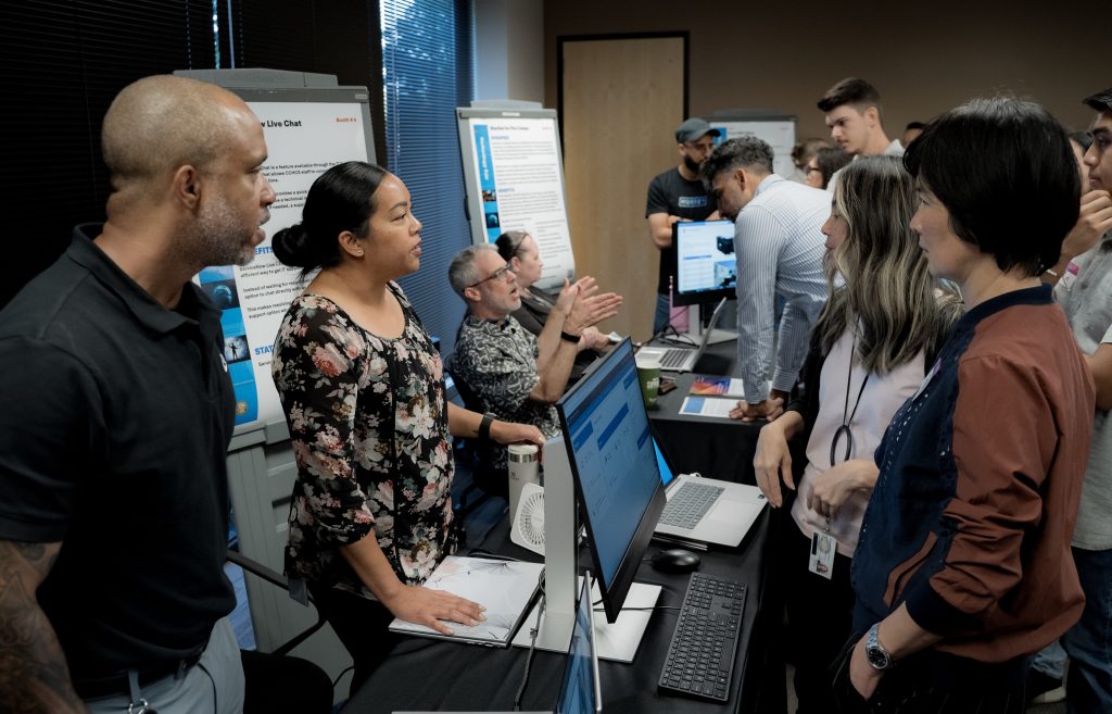 staff attending tech fair