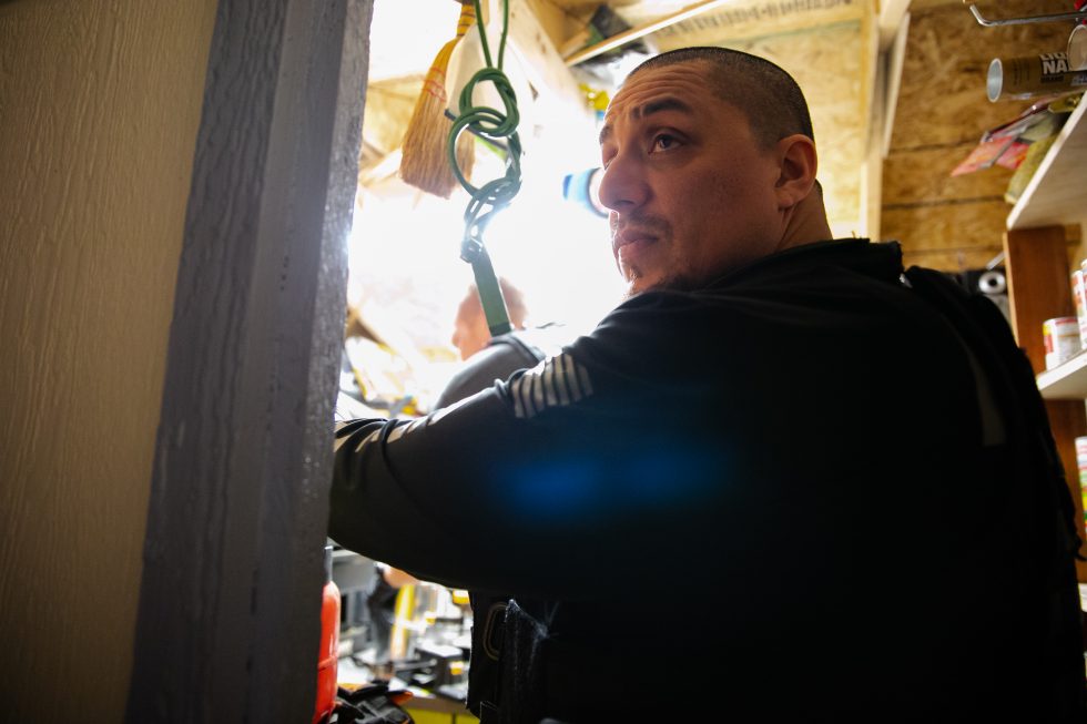 Searching a building during Operation Book.