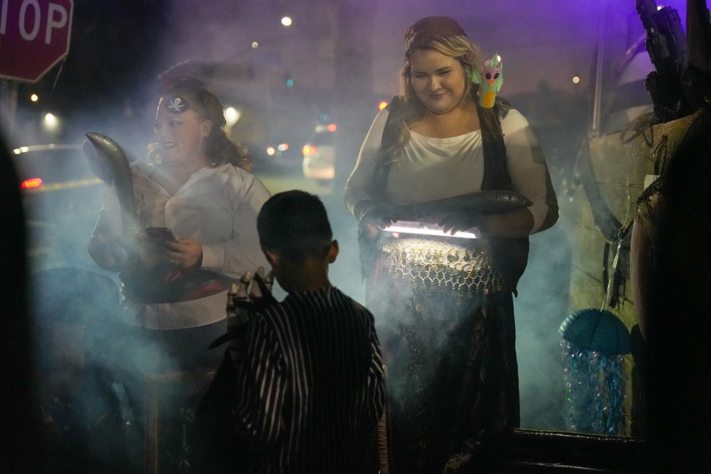 Fog machine and people handing out candy at CIM.