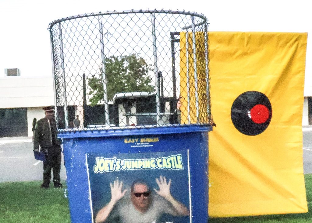 Dunk tank with Captain Frazier in the water.
