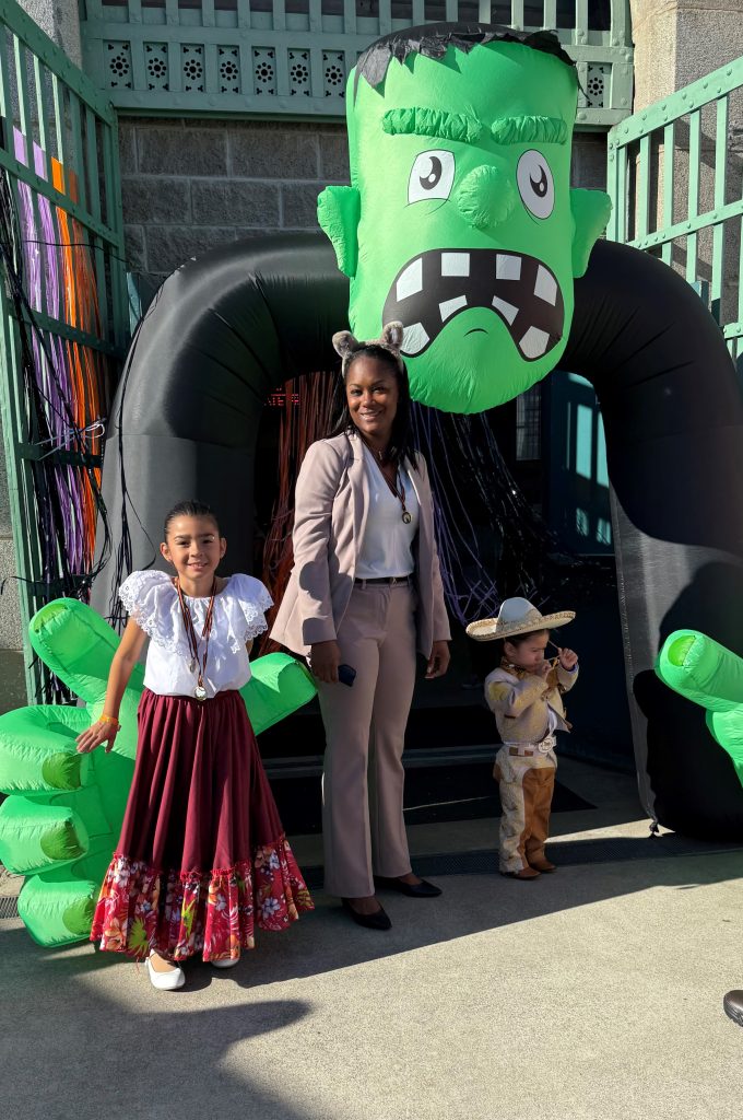Acting Warden Hill with trick-or-treaters