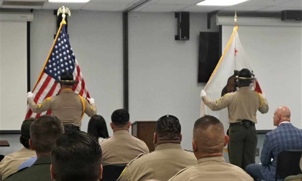 Kern Valley Honor Guard presents the colors.