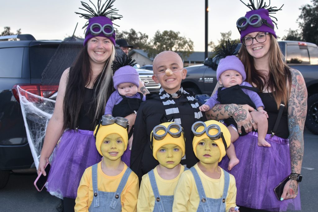 Mule Creek State Prison winning costumes at community trunk or treat event in Ione with minions and Gru.