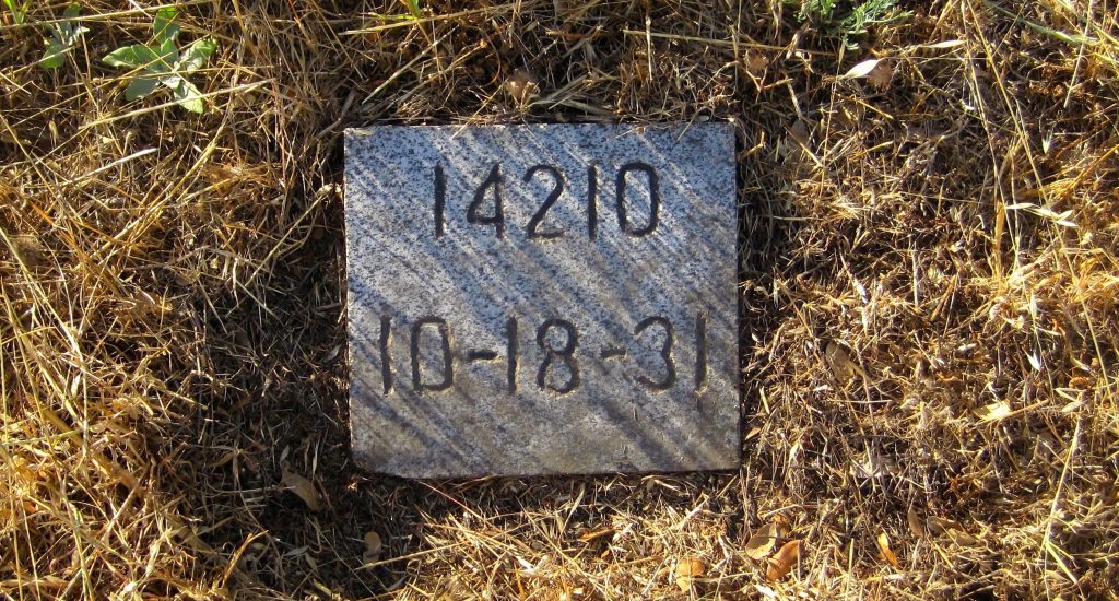 Grave marker at Folsom State Prison for J.E. McKim, 14210, Oct. 18, 1931.