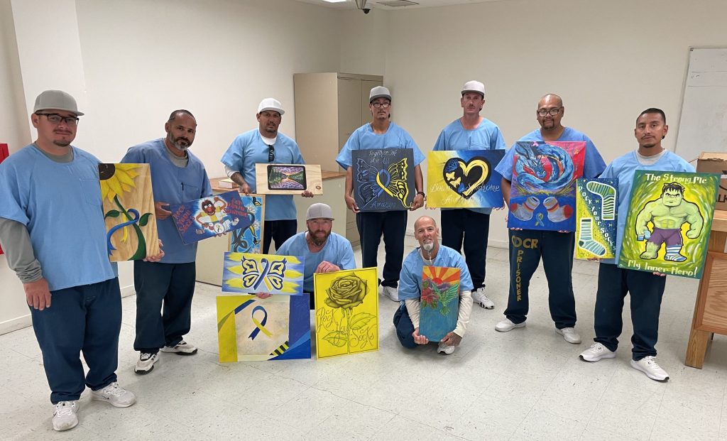 PVSP incarcerated artists with their artwork to be auctioned off