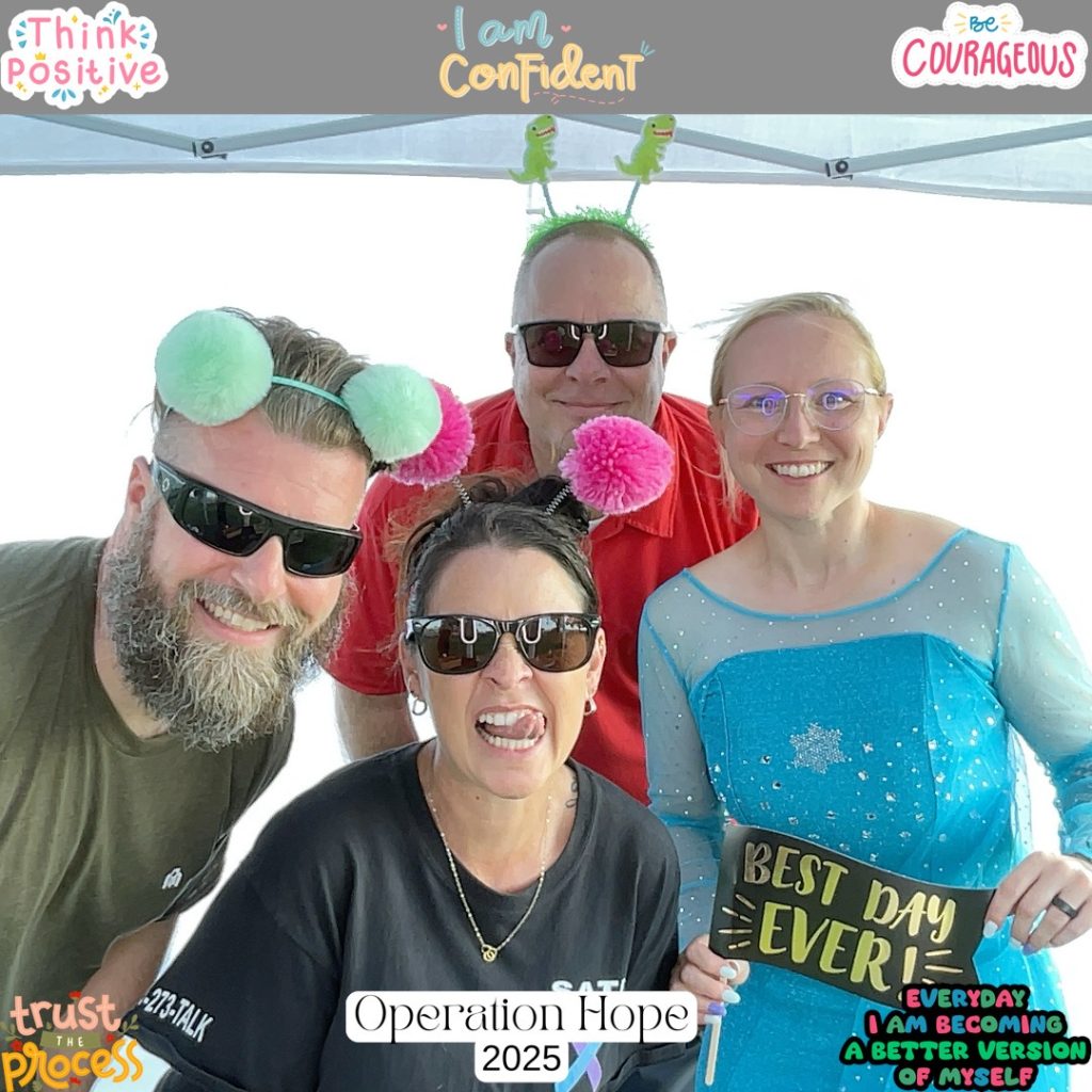 A photo booth with four people.