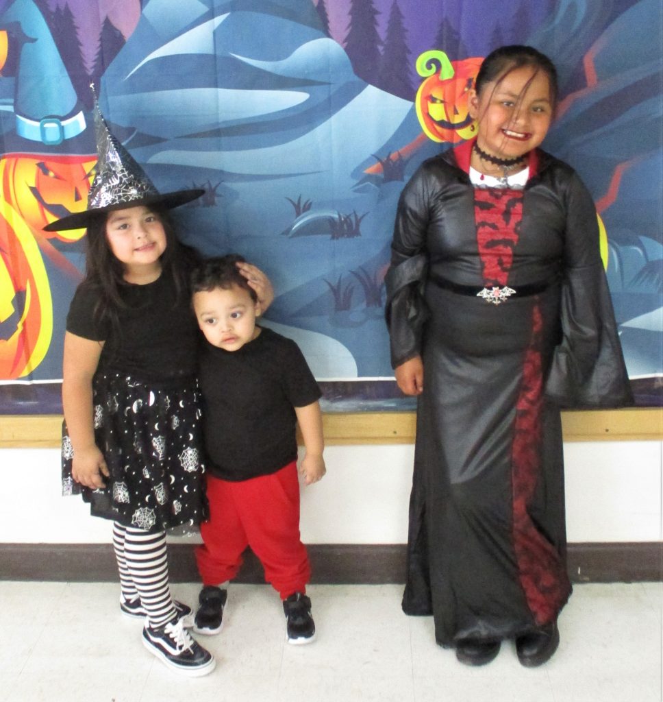 Costume-wearing kids at Centinela State Prison during a special visiting event.