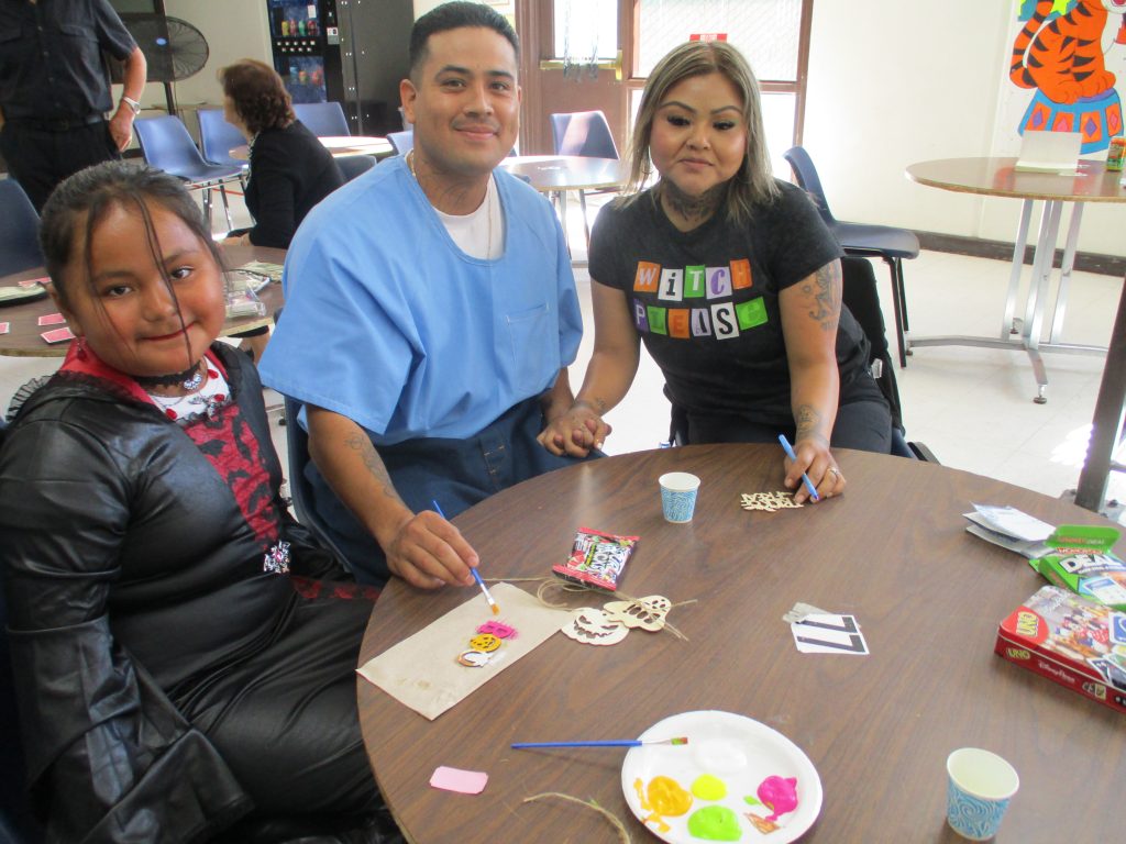 Family visiting for Halloween at Centinela State Prison.