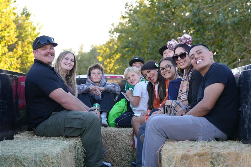 staff enjoying a hayride