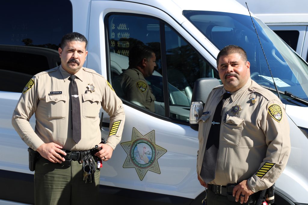 CMC transportation officers Naranjo and Contreras.